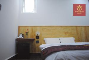 Voodi või voodid majutusasutuse Bảo Thịnh 2 Hotel toas