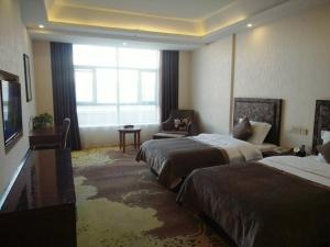 Photo de la galerie de l'établissement Dunhuang Dasheng Vacation Hotel, à Dunhuang