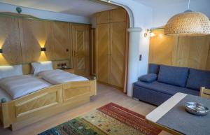 Postel nebo postele na pokoji v ubytování Appartement Pension Strolz