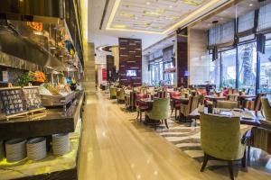 Restaurace v ubytování Wanda Vista Quanzhou + 35 fotografií