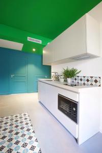 Kuchyň nebo kuchyňský kout v ubytování L'Abeille - Boutique Apartments