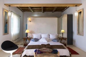 Postel nebo postele na pokoji v ubytování Riad Tamayourt Ocean View & piscine chauffée à 30