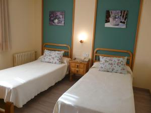Rúm í herbergi á Hotel Nice