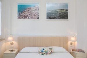 A bed or beds in a room at Amazing Penthouse Piazza Venezia