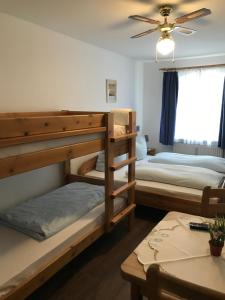 Postel nebo postele na pokoji v ubytování Hotel Guntia Boardinghouse