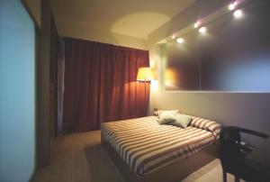 Cama o camas de una habitación en Hotel President