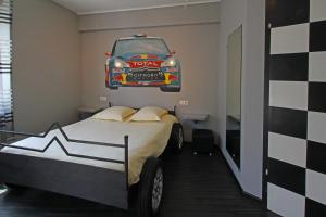 Postel nebo postele na pokoji v ubytování Hotel Champ Alsace