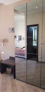 Posteľ alebo postele v izbe v ubytovaní Mia Suites