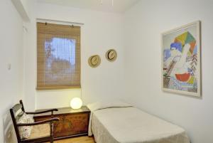 A bed or beds in a room at Villa Loutraki Sunset