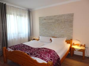 Postel nebo postele na pokoji v ubytování Hotel & Weinstube Restaurant Filling