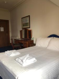 Postel nebo postele na pokoji v ubytování Westerlea Hotel Nairn