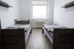 Posteľ alebo postele v izbe v ubytovaní Kopačka