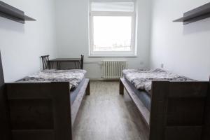 Postel nebo postele na pokoji v ubytování Kopačka