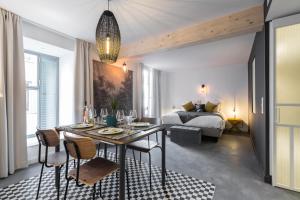 Postel nebo postele na pokoji v ubytování L'Abeille - Boutique Apartments