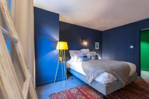 Postel nebo postele na pokoji v ubytování L'Abeille - Boutique Apartments