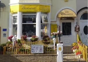a flower shop with a sign in front of it at The Berkswell in Blackpool