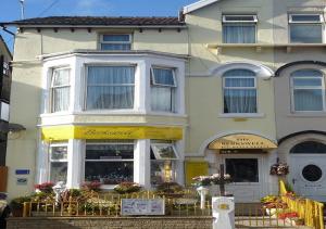a building with a store in front of it at The Berkswell in Blackpool