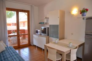 A kitchen or kitchenette at Villaggio Capistrano Még 6 kép