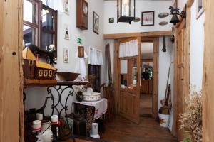 a hallway of a house with a room with a door at Vila Javorinka in Tatranská Kotlina