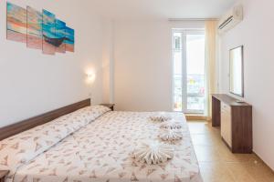 Postel nebo postele na pokoji v ubytování Aparthotel Costa Calma