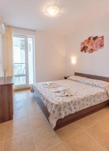 Postel nebo postele na pokoji v ubytování Aparthotel Costa Calma