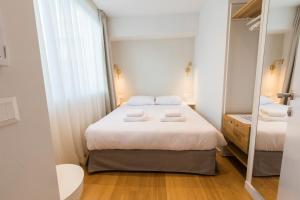 Posteľ alebo postele v izbe v ubytovaní Syntagma Apartments by Olala Homes + 37 fotografií