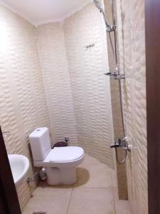 A bathroom at Midas Hotel