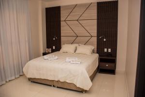 Katil atau katil-katil dalam bilik di SERPYL Plaza Hotel