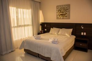 Katil atau katil-katil dalam bilik di SERPYL Plaza Hotel