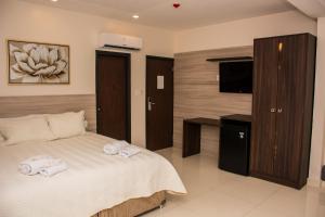Katil atau katil-katil dalam bilik di SERPYL Plaza Hotel