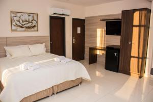 Katil atau katil-katil dalam bilik di SERPYL Plaza Hotel