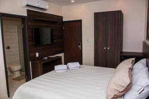 Katil atau katil-katil dalam bilik di SERPYL Plaza Hotel