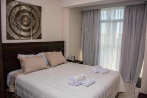 Katil atau katil-katil dalam bilik di SERPYL Plaza Hotel