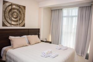 Katil atau katil-katil dalam bilik di SERPYL Plaza Hotel