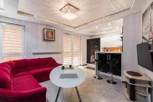 Televisyen dan/atau pusat hiburan di NotaBene Wola Apartment