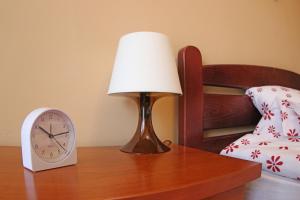 A bed or beds in a room at Levendula apartman