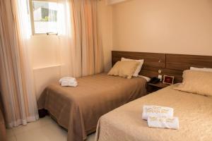 Katil atau katil-katil dalam bilik di SERPYL Plaza Hotel