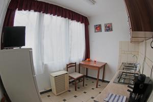 A television and/or entertainment centre at Levendula apartman