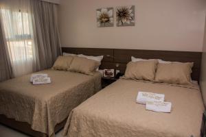 Katil atau katil-katil dalam bilik di SERPYL Plaza Hotel