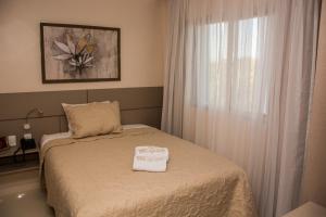 Katil atau katil-katil dalam bilik di SERPYL Plaza Hotel