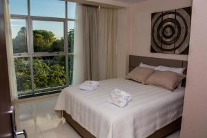 Katil atau katil-katil dalam bilik di SERPYL Plaza Hotel