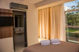 Katil atau katil-katil dalam bilik di SERPYL Plaza Hotel