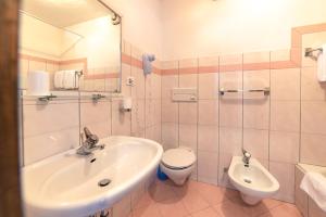 Kúpeľňa v ubytovaní Sonnen Residence + 20 fotografií