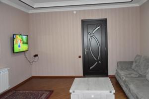 TV a/nebo společenská místnost v ubytování Guest House Ana