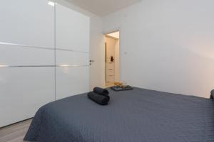 Posteľ alebo postele v izbe v ubytovaní Marea Apartments