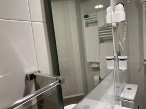 Koupelna v ubytování Hotel Herreros