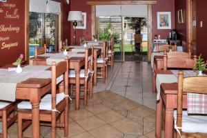 Restoran või mõni muu söögikoht majutusasutuses Hostal Cepa Noble