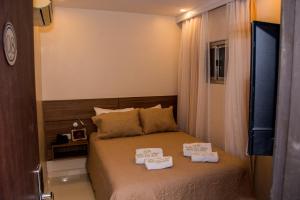 Katil atau katil-katil dalam bilik di SERPYL Plaza Hotel