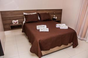 Katil atau katil-katil dalam bilik di SERPYL Plaza Hotel