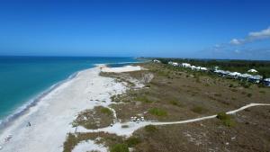 an aerial view of an island in the ocean at Palm Island Villa 3 Bedroom Superior Villa in Cape Haze